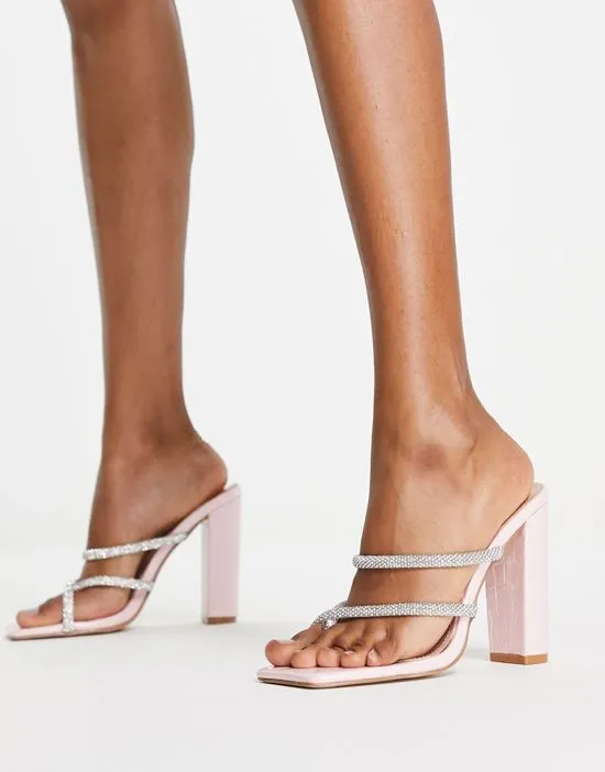 https://images.styletyx.com/images/simmi-london-heera-heeled-mules-with-embellished-straps-in-pink-simmi-shoes-2411410_4.webp