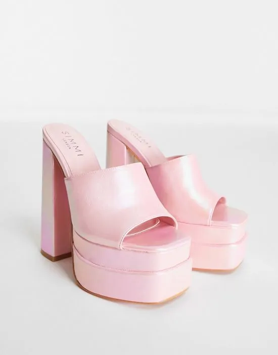 https://images.styletyx.com/images/simmi-london-martha-stacked-platform-mules-in-iridescent-orange-simmi-shoes-162732200_3.webp
