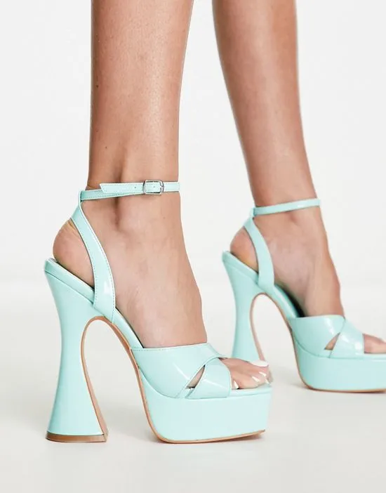 https://images.styletyx.com/images/simmi-london-oceani-platforms-with-flared-heel-in-mint-patent-simmi-shoes-266801755_3.webp