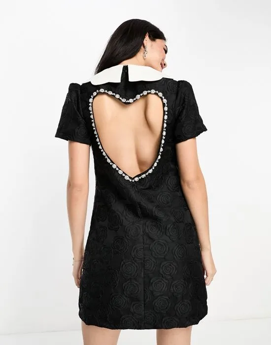 https://images.styletyx.com/images/sister-jane-embellished-heart-cut-out-mini-dress-in-black-sister-jane-1893582318_4.webp