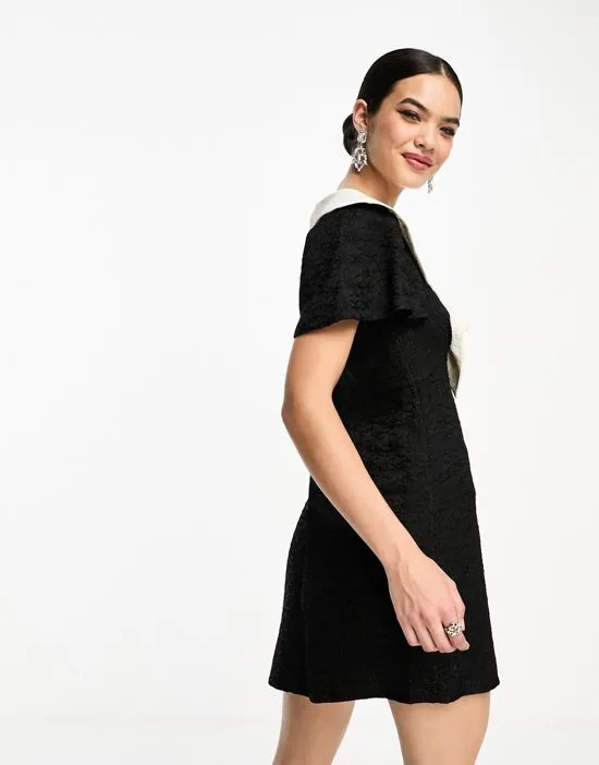 https://images.styletyx.com/images/sister-jane-oversized-collar-corsage-mini-dress-in-black-sister-jane-1004201971_3.webp