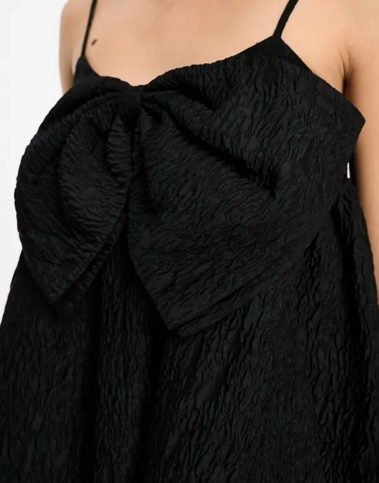 https://images.styletyx.com/images/sister-jane-puffball-bow-jacquard-mini-dress-in-black-sister-jane-1876563634_2.webp