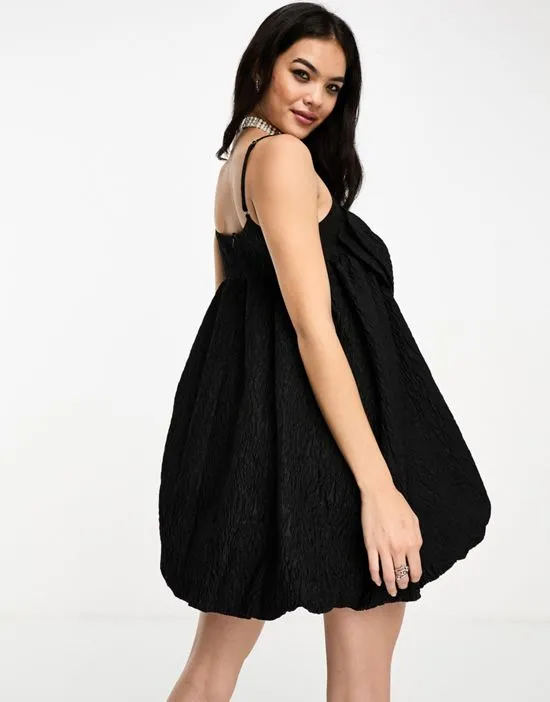 https://images.styletyx.com/images/sister-jane-puffball-bow-jacquard-mini-dress-in-black-sister-jane-1876563634_3.webp