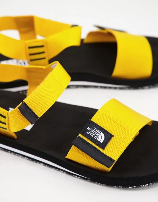 https://images.styletyx.com/images/skeena-sandals-in-yellow-the-north-face-2997556_2.webp