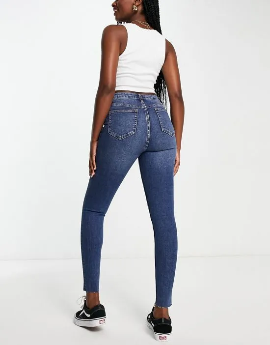 https://images.styletyx.com/images/skinny-jean-in-mid-wash-miss-selfridge-13210420_2.webp