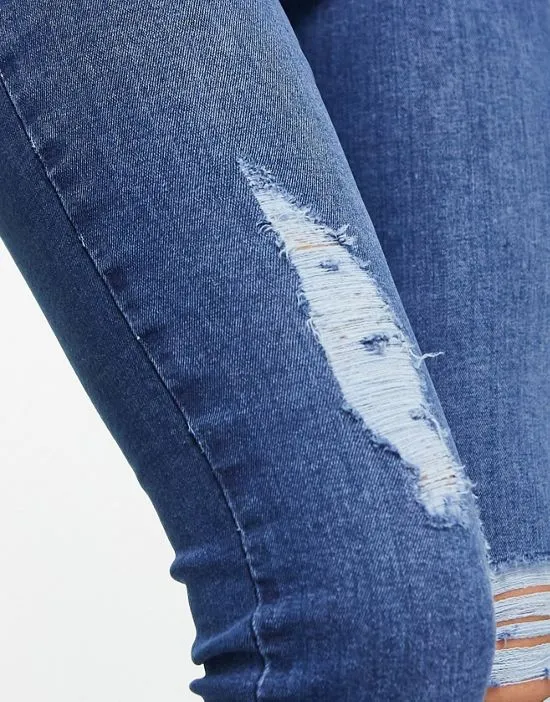 https://images.styletyx.com/images/skinny-jeans-with-rips-in-mid-wash-blue-parisian-petite-13285863_3.webp