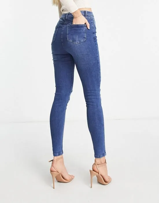https://images.styletyx.com/images/skinny-jeans-with-rips-in-mid-wash-blue-parisian-tall-13285861_3.webp