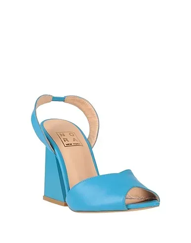https://images.styletyx.com/images/sky-blue-leather-sandals-nora-new-york-13125584_2.webp