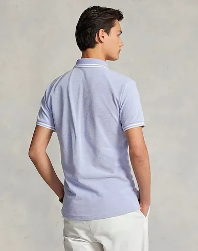 https://images.styletyx.com/images/sky-blue-polo-shirt-sskctipcusm3-short-sleeve-polo-shirt-ralph-lauren-13039885_3.webp