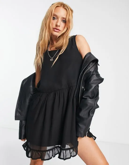 https://images.styletyx.com/images/sleeveless-smock-dress-in-black-bolongaro-trevor-13293759_3.webp