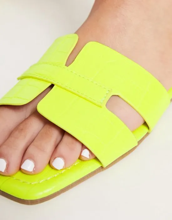 https://images.styletyx.com/images/slip-on-mule-slides-in-lime-truffle-collection-wide-fit-13315670_3.webp
