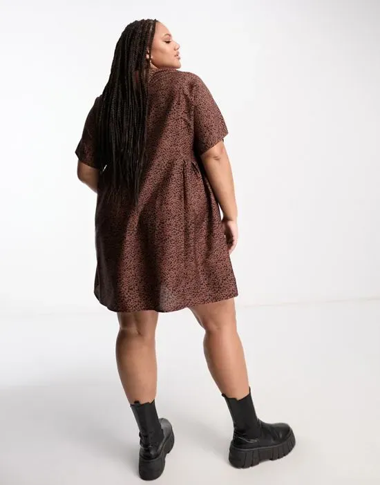 https://images.styletyx.com/images/smudge-spot-mini-smock-dress-in-brown-wednesday-s-girl-curve-13140221_2.webp