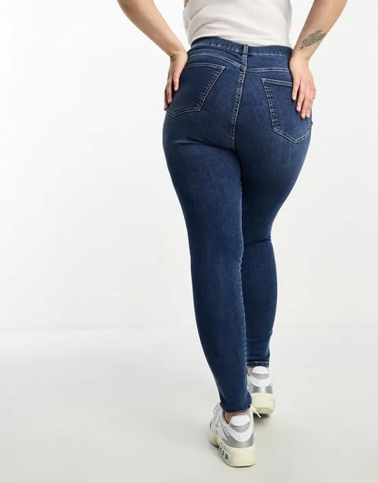 https://images.styletyx.com/images/solitaire-skinny-jeans-in-mid-blue-dr-denim-plus-1004949032_2.webp