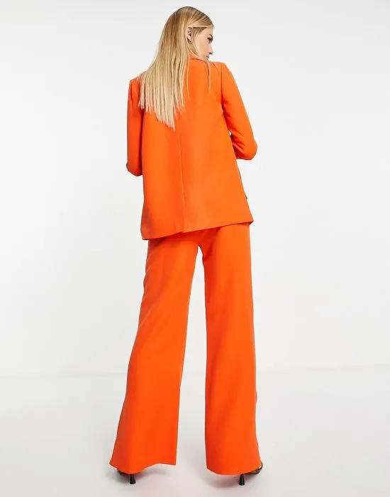 https://images.styletyx.com/images/split-hem-pants-in-orange-part-of-a-set-annorlunda-1905960_2.webp