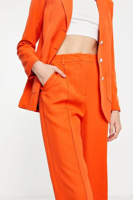 https://images.styletyx.com/images/split-hem-pants-in-orange-part-of-a-set-annorlunda-1905960_3.webp