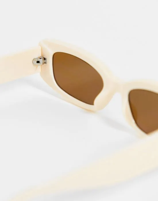 https://images.styletyx.com/images/square-sunglasses-in-cream-pieces-13117498_4.webp