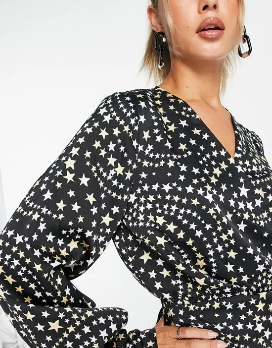 https://images.styletyx.com/images/star-print-tie-waist-mini-dress-in-black-never-fully-dressed-3237885_4.webp