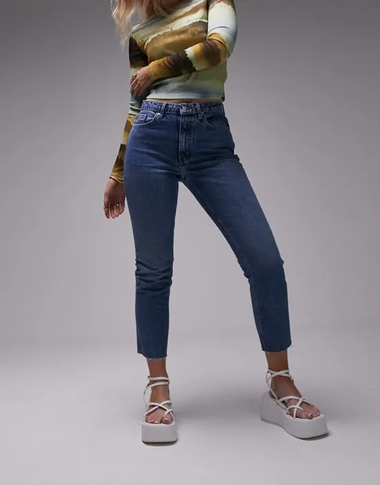 https://images.styletyx.com/images/straight-jeans-in-mid-blue-topshop-hourglass-2765570_2.webp