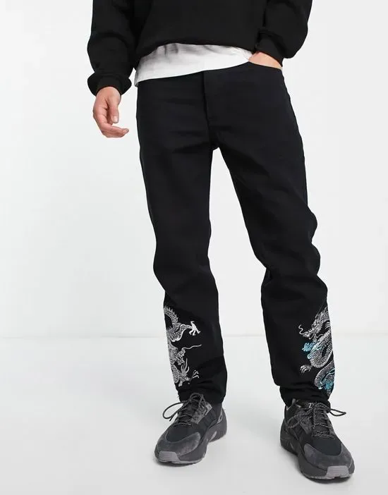 https://images.styletyx.com/images/straight-leg-denim-jeans-in-black-with-dragon-embroidery-liquor-n-poker-13554230_1.webp
