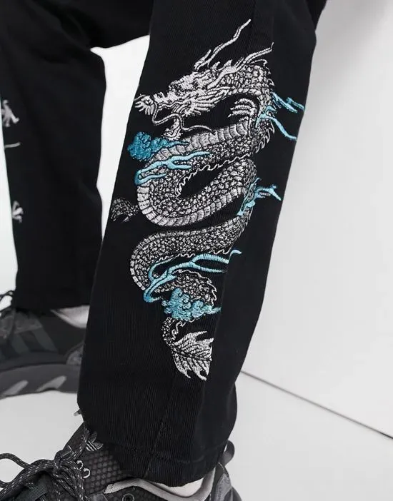 https://images.styletyx.com/images/straight-leg-denim-jeans-in-black-with-dragon-embroidery-liquor-n-poker-13554230_3.webp