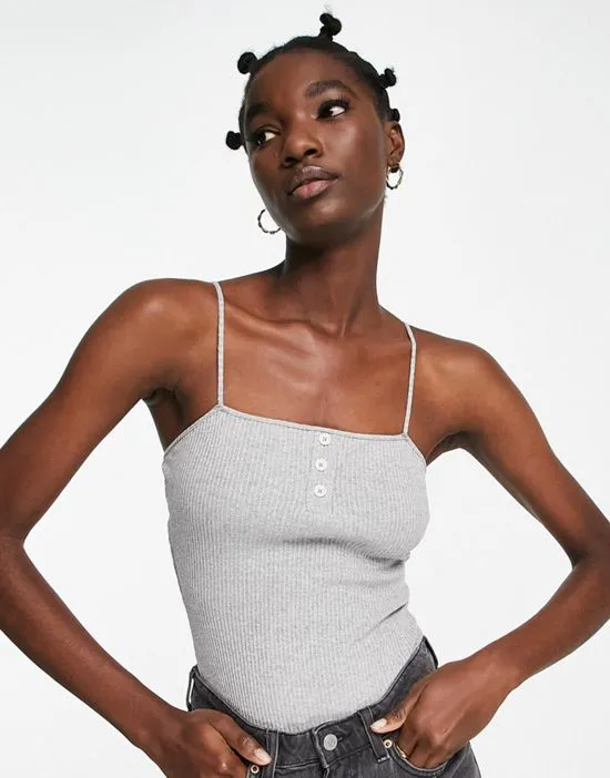 https://images.styletyx.com/images/strappy-bodysuit-in-rib-button-detail-in-gray-heather-asos-design-1883418_1.webp