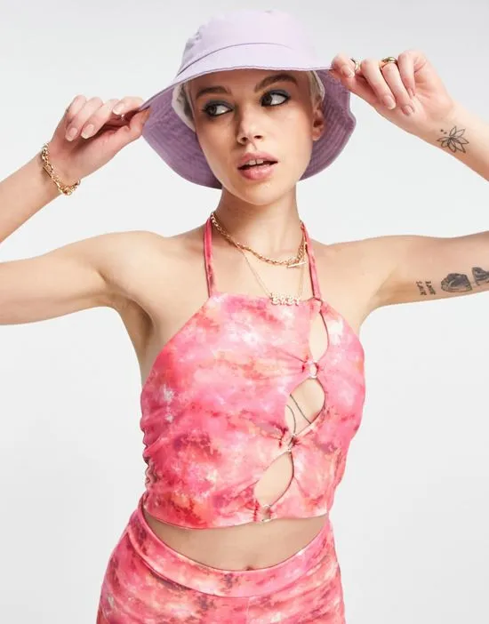 https://images.styletyx.com/images/strappy-crop-top-with-ring-cut-out-detail-in-pink-print-part-of-a-set-daisy-street-2174927_3.webp