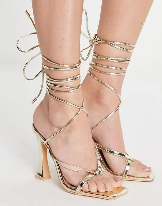 https://images.styletyx.com/images/strappy-heeled-sandals-in-gold-glamorous-2807714_3.webp