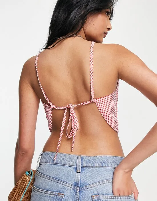 https://images.styletyx.com/images/strappy-open-back-crop-top-in-red-gingham-lola-may-1946038_2.webp