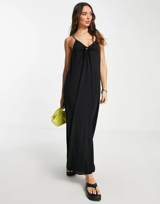 https://images.styletyx.com/images/strappy-pleated-back-maxi-dress-with-tie-detail-in-black-asos-design-1836616_1.webp