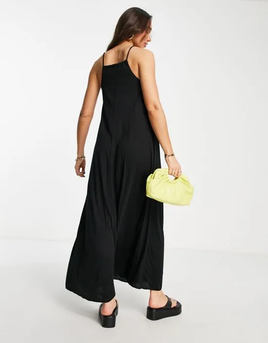 https://images.styletyx.com/images/strappy-pleated-back-maxi-dress-with-tie-detail-in-black-asos-design-1836616_2.webp