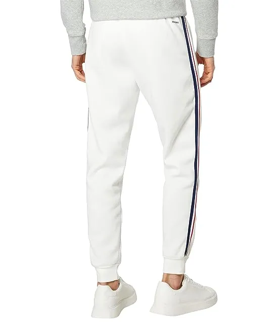 https://images.styletyx.com/images/stripe-tape-fleece-joggers-u-s-polo-assn-13665414_2.webp