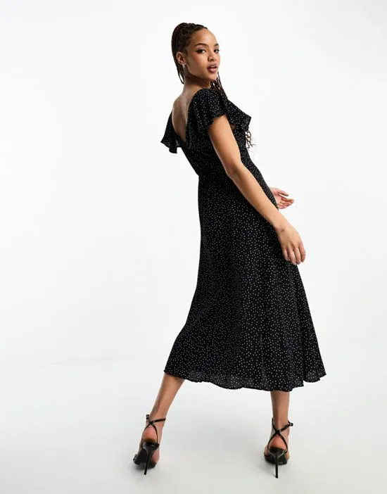 https://images.styletyx.com/images/suki-midi-dress-in-black-and-white-polka-dot-nobody-s-child-870194460_3.webp