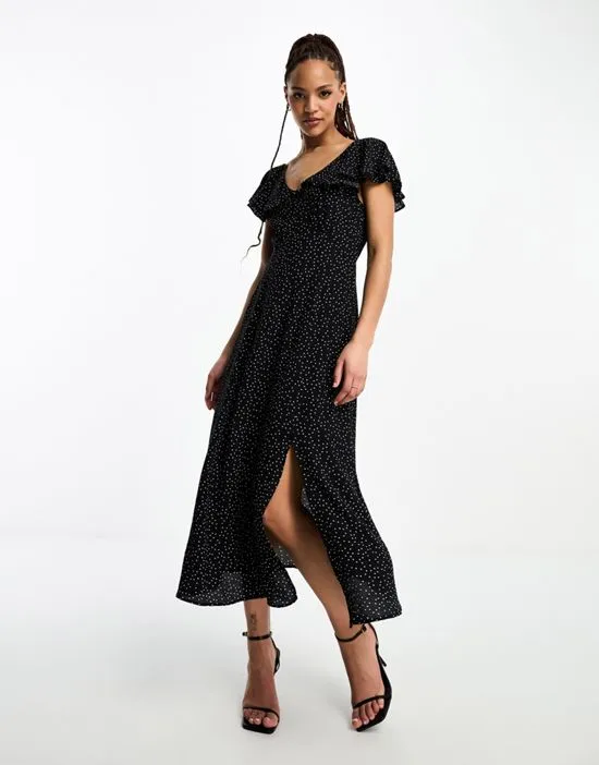 https://images.styletyx.com/images/suki-midi-dress-in-black-and-white-polka-dot-nobody-s-child-870194460_4.webp