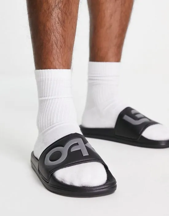 https://images.styletyx.com/images/summerville-slides-in-black-oakley-13693518_1.webp