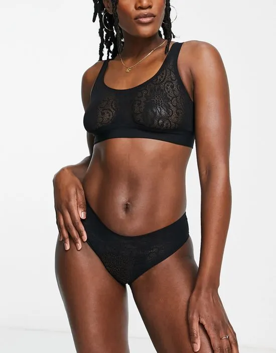 https://images.styletyx.com/images/super-soft-nylon-blend-barely-there-lace-brazilian-brief-in-black-black-lindex-3327998_2.webp