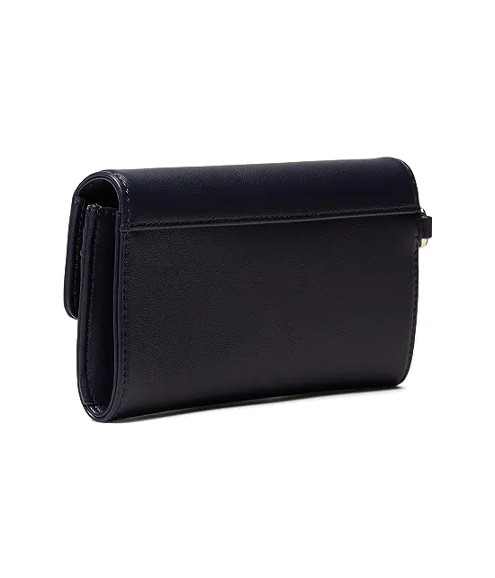 https://images.styletyx.com/images/sutton-wristlet-solid-pvc-tommy-hilfiger-13029888_2.webp