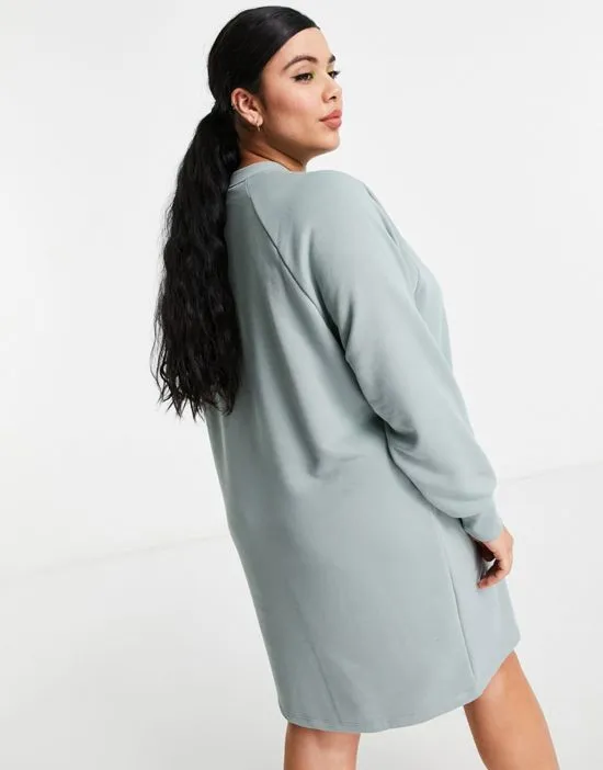 https://images.styletyx.com/images/sweat-mini-dress-in-washed-blue-noisy-may-curve-2559717_2.webp