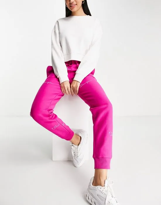 https://images.styletyx.com/images/sweatpants-with-repeat-logo-in-pink-champion-2031442_4.webp