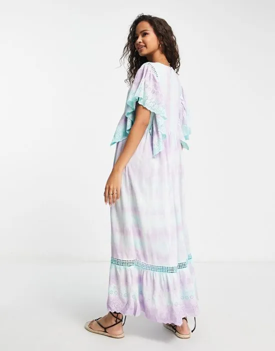 https://images.styletyx.com/images/sweet-tooth-tie-dye-maxi-smock-dress-in-blue-raga-13454984_3.webp
