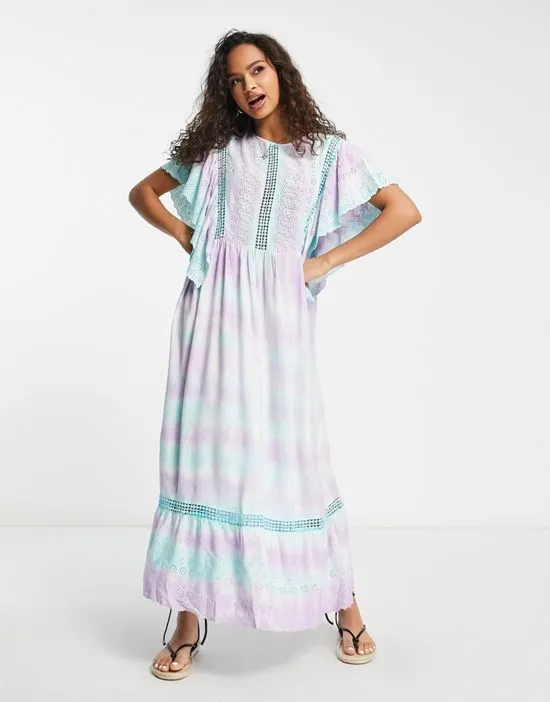 https://images.styletyx.com/images/sweet-tooth-tie-dye-maxi-smock-dress-in-blue-raga-13454984_4.webp
