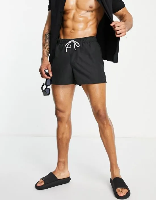 https://images.styletyx.com/images/swim-shorts-in-short-length-in-black-asos-design-1820259_1.webp