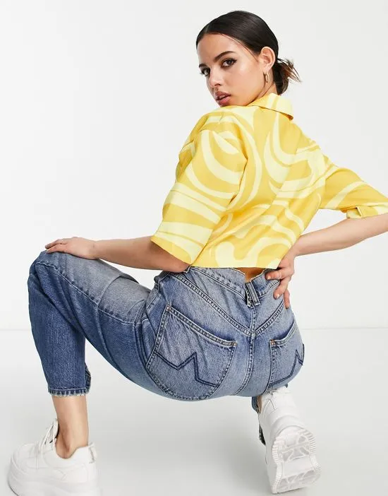 https://images.styletyx.com/images/swirl-print-cropped-shirt-in-yellow-fila-1893674_2.webp