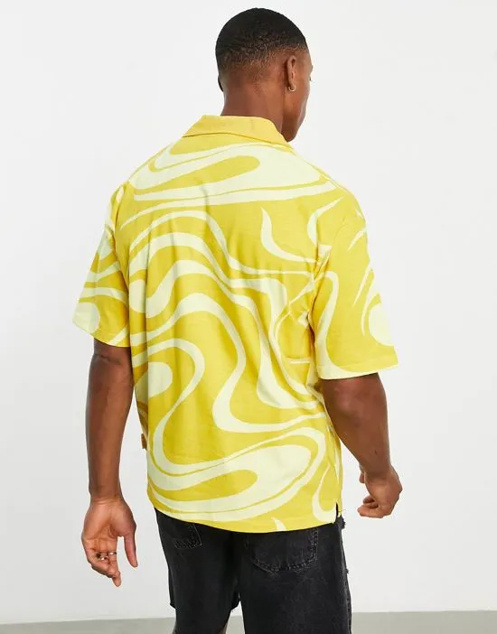 https://images.styletyx.com/images/swirl-print-polo-shirt-in-yellow-exclusive-to-asos-fila-13325386_2.webp