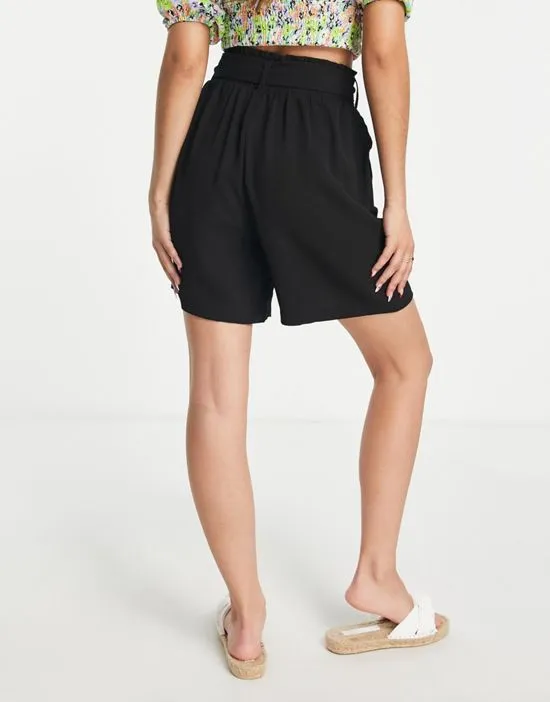 https://images.styletyx.com/images/tailored-high-waisted-paperbag-shorts-in-black-pieces-1856361_2.webp