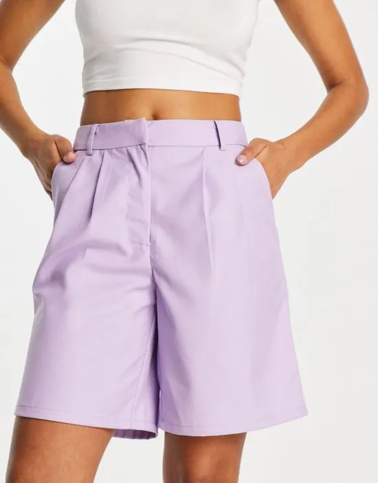 https://images.styletyx.com/images/tailored-longline-shorts-in-lilac-part-of-a-set-pieces-2718135_1.webp