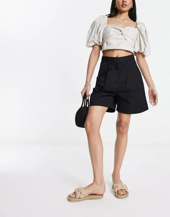 https://images.styletyx.com/images/tailored-turn-up-shorts-in-black-monki-216842326_4.webp
