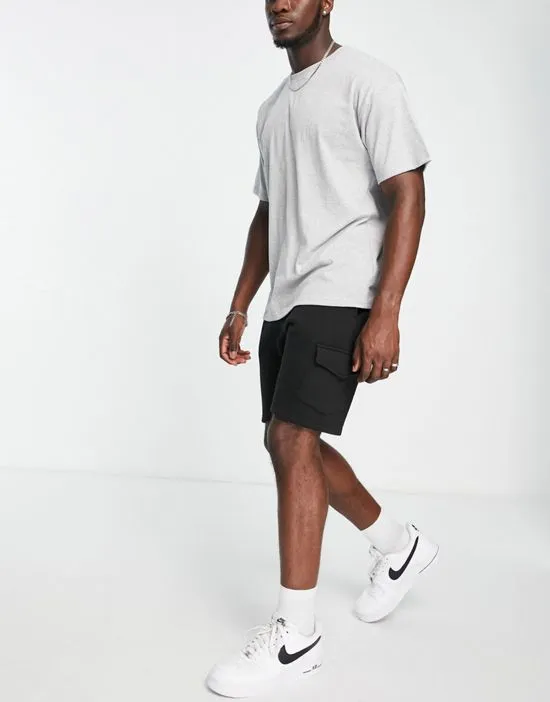 https://images.styletyx.com/images/tall-cargo-pocket-jersey-shorts-in-black-le-breve-13286340_3.webp