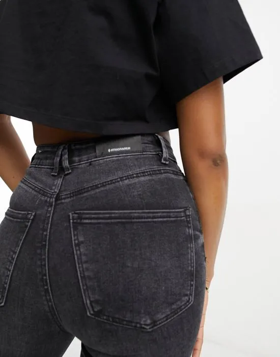 https://images.styletyx.com/images/tall-super-high-waist-skinny-jean-in-black-wash-stradivarius-13232026_4.webp
