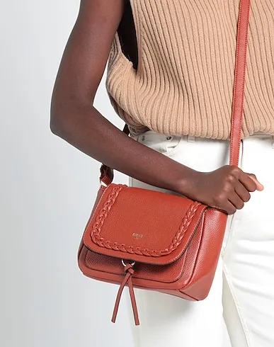 https://images.styletyx.com/images/tan-cross-body-bags-rodier-1207800_3.webp