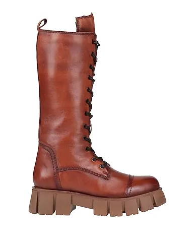 https://images.styletyx.com/images/tan-leather-boots-bothega-41-1493105997_1.webp